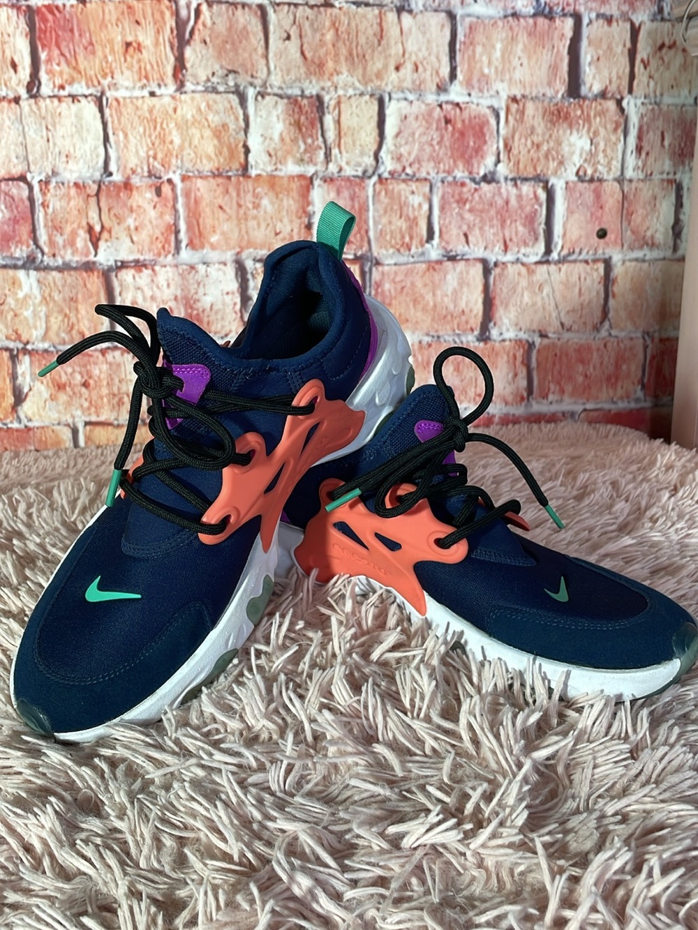 Nike Kids Navy Sneakers with Coral and Teal Accents